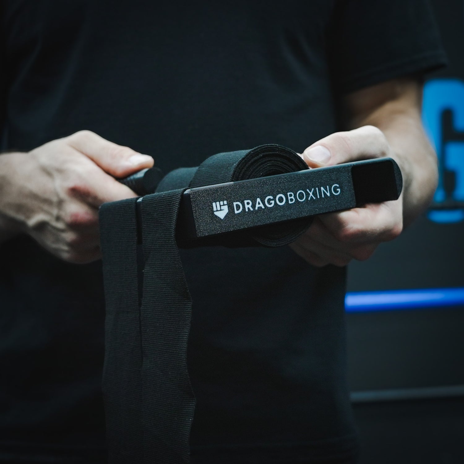 Drago Roller rolling boxing hand wraps simultaneously