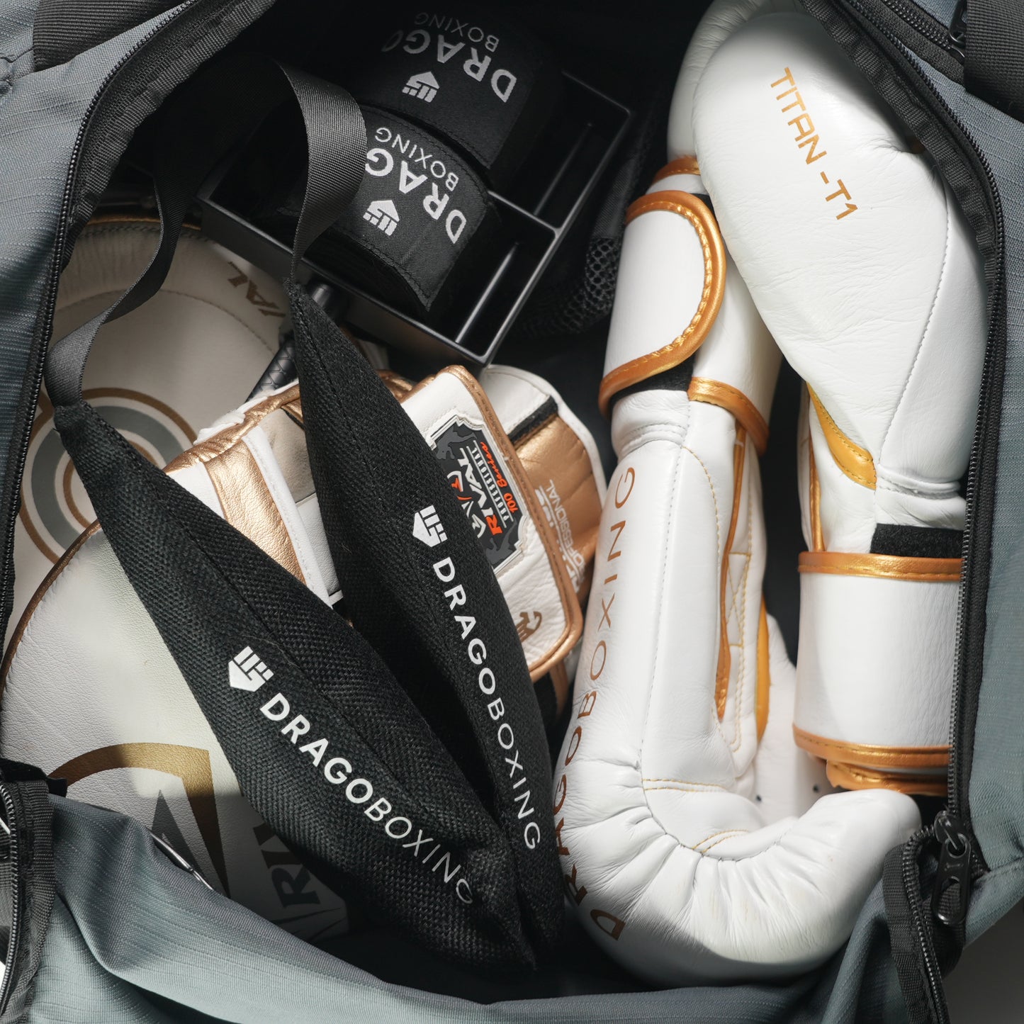 Drago glove deodorizers in a gym bag with boxing gloves