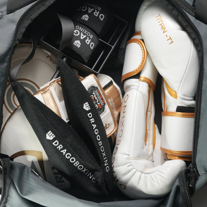 Drago glove deodorizers in a gym bag with boxing gloves